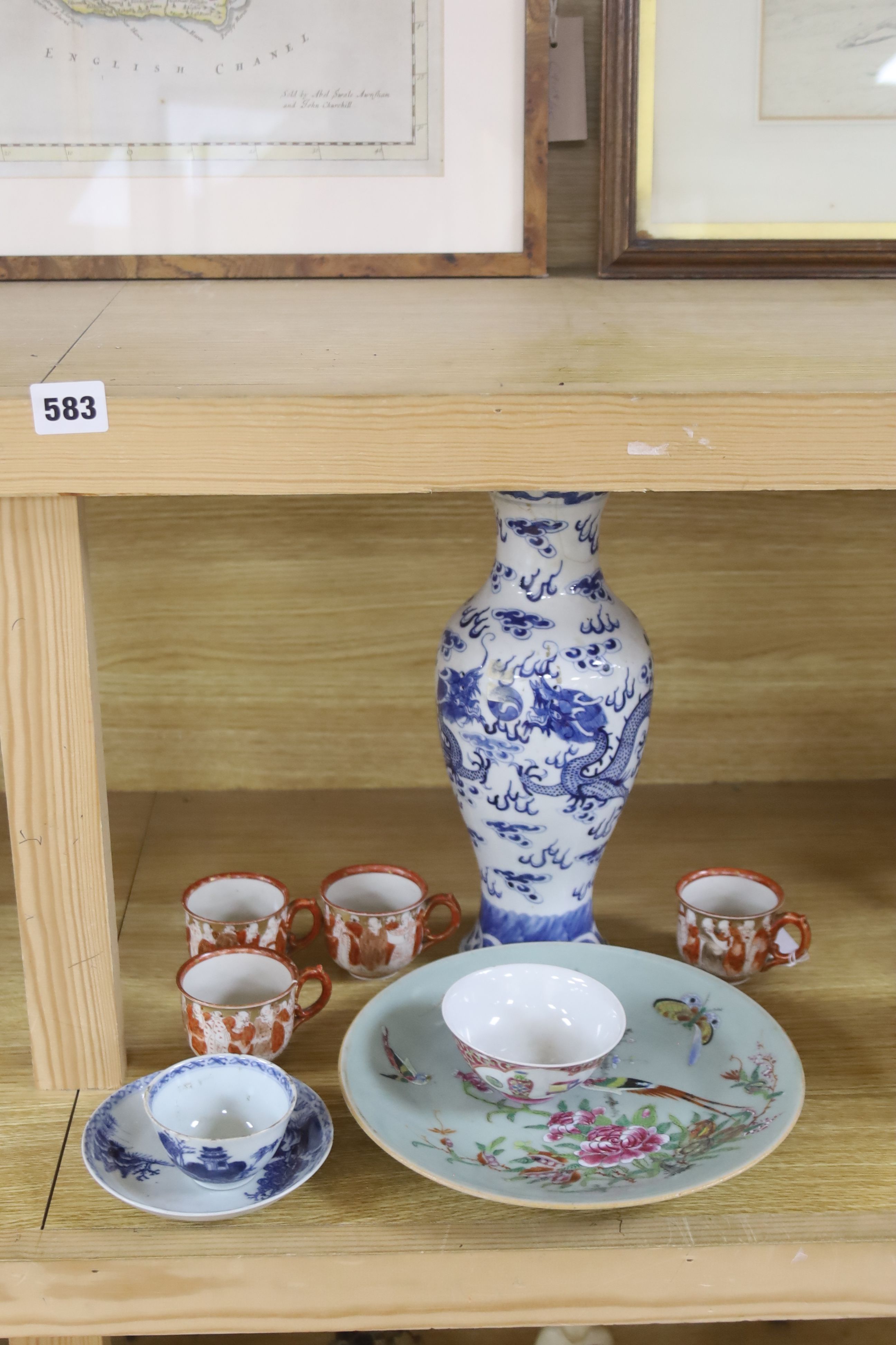 A Chinese blue and white dragon vase, a celadon glazed dish, a blue and white tea bowl and saucer and Kutani wares